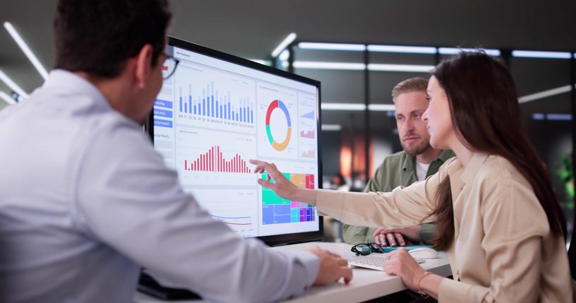 Businesswoman Managing Company Data Using Analytics Dashboard For Financial Performance.